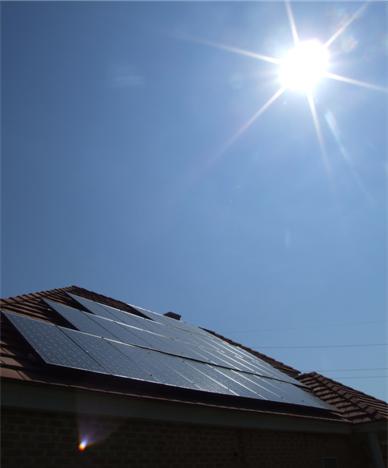 Sun shining on solar panels at firehouse Sun shining on solar panels at firehouse